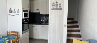 A cozy nest, for the holidays, in yellow and blue.