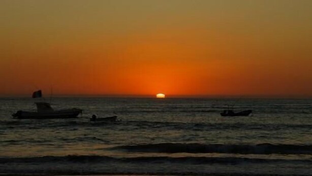 A sunset over the ocean with boats. - Saly: House / Villa - Saly (Saly)