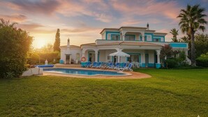 A large house with a swimming pool and lounge chairs. - Luxury villa with private pool, seaview, 2300qm (Alvor)