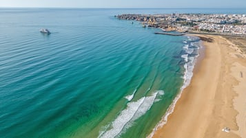 Beach nearby, sun-loungers, beach towels