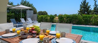 Lovingly furnished house in a quiet location with heated pool and sea views