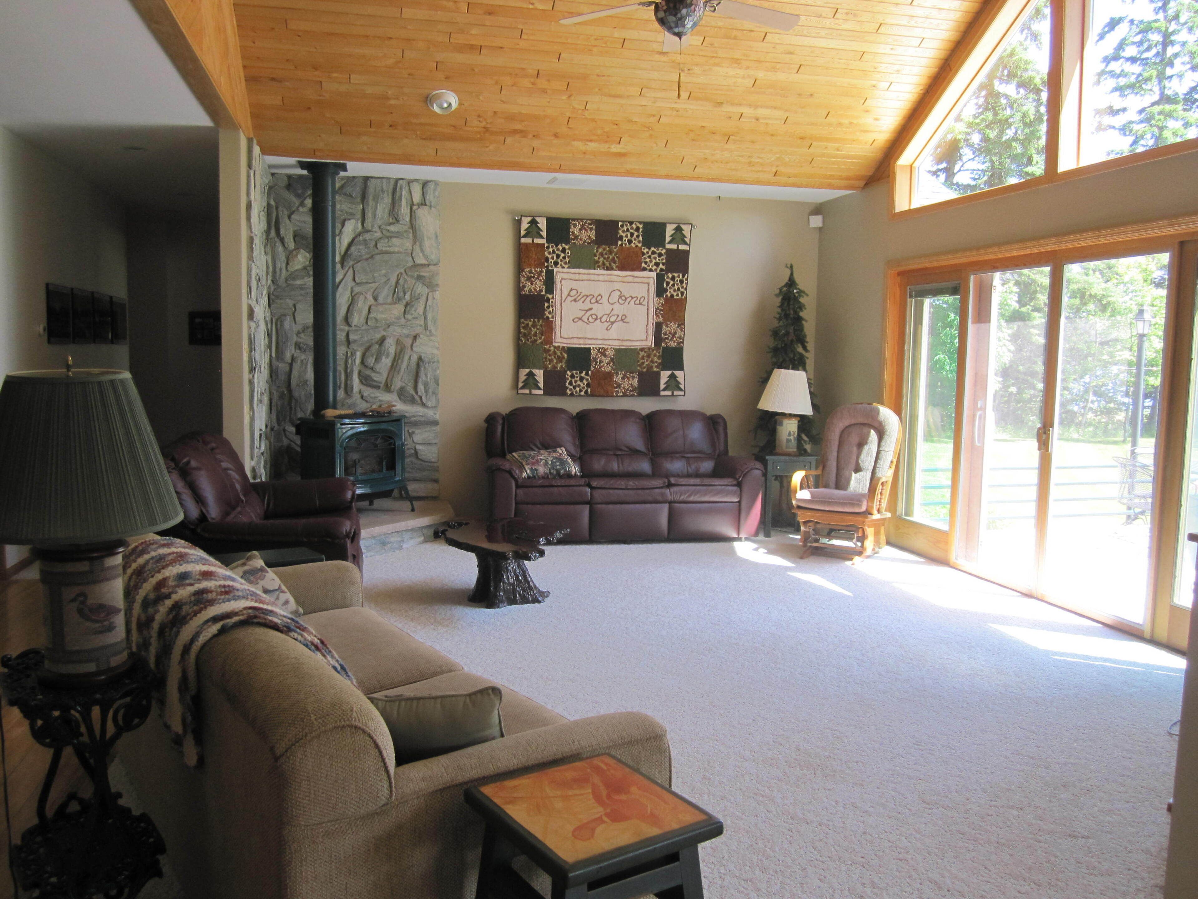 Comfortable home with amazing porch located on Big Sand Lake & Pine Cone Lodge