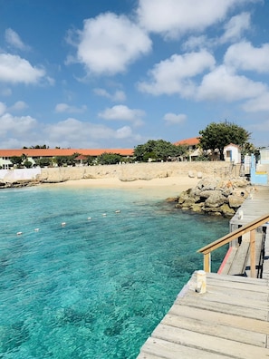 On the beach, sun loungers, beach towels