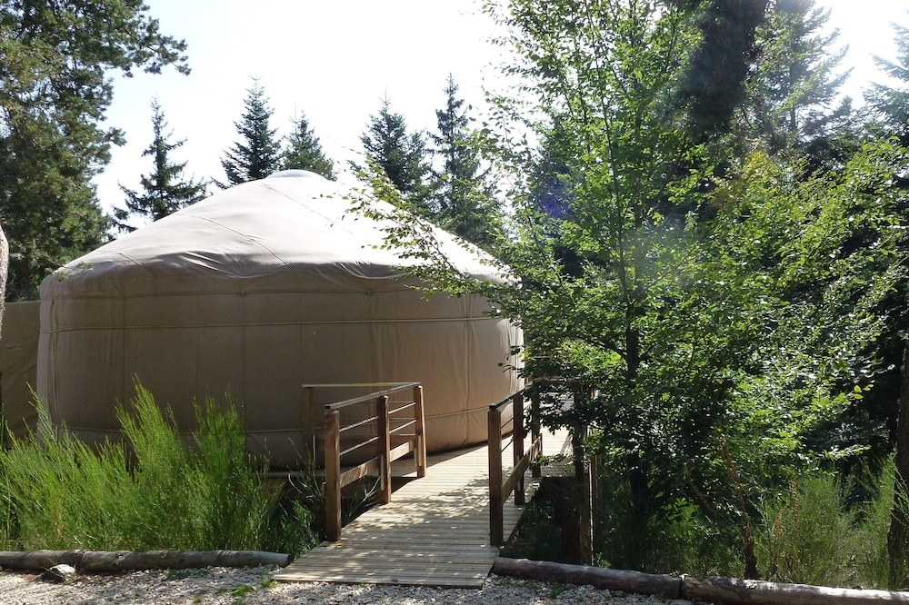 1 contemporary comfortable yurt located in a wood terrace with a view.
