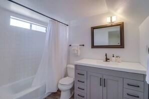 Combined shower/bathtub, hair dryer