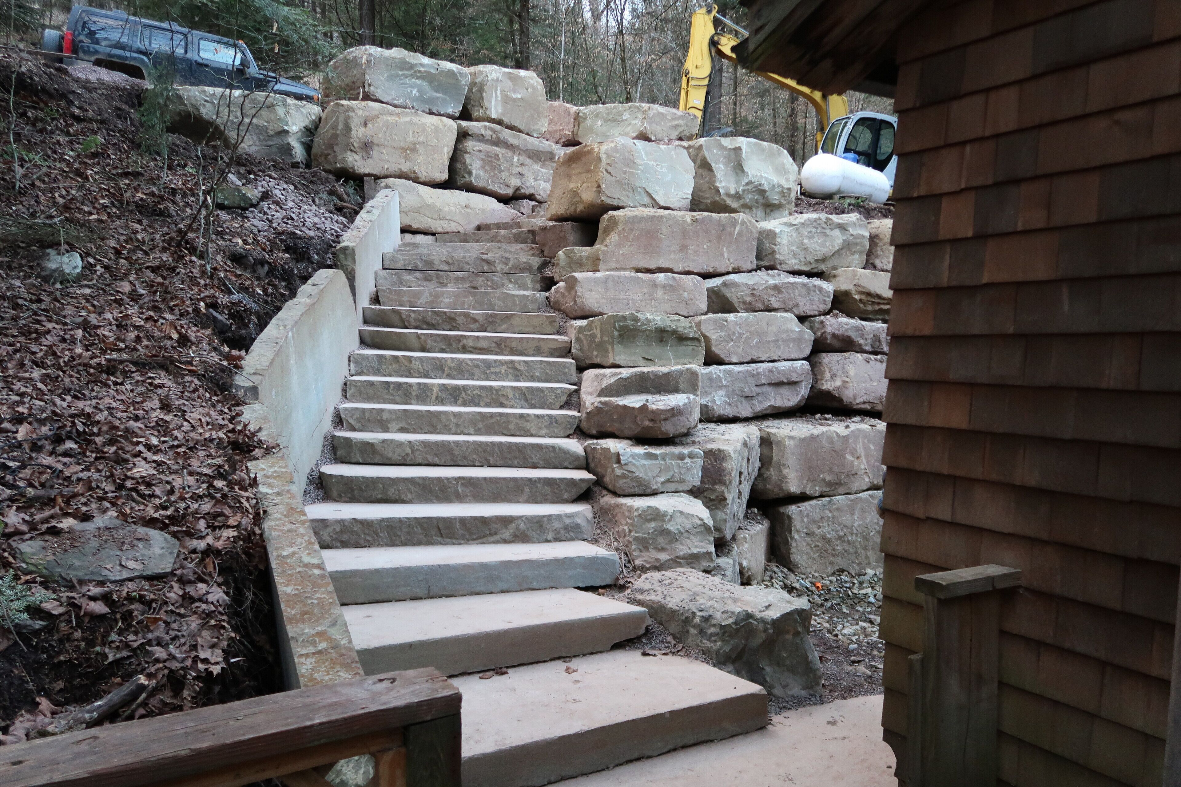 Rock steps all placed and wall close to completion.