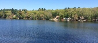 House on The Lake Is a peaceful getaway with beautful grounds with stonewalls