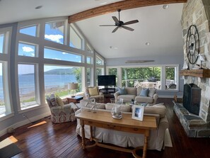 Smart TV, fireplace, DVD player, books