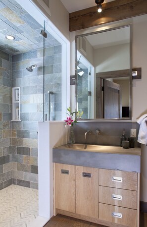 Bathtub, hair dryer, towels, soap