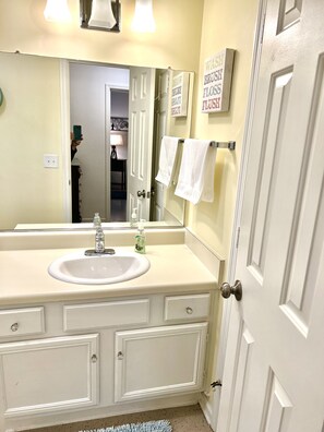 Combined shower/bathtub, hair dryer, towels, soap