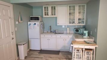 Fridge, microwave, coffee/tea maker, toaster