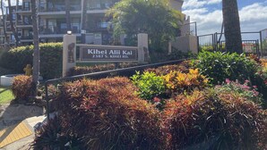 A sign for Kihei Alii Kai at 2387 S. KIHEI RD. - Read our Reviews! Newly Updated Condo! Perfect Getaway Steps to Beach & Dining! (Kihei)