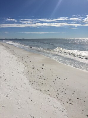 On the beach, sun-loungers, beach towels