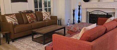 Smart TV, fireplace, foosball, books