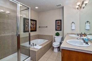 Combined shower/bathtub, hair dryer, towels, soap
