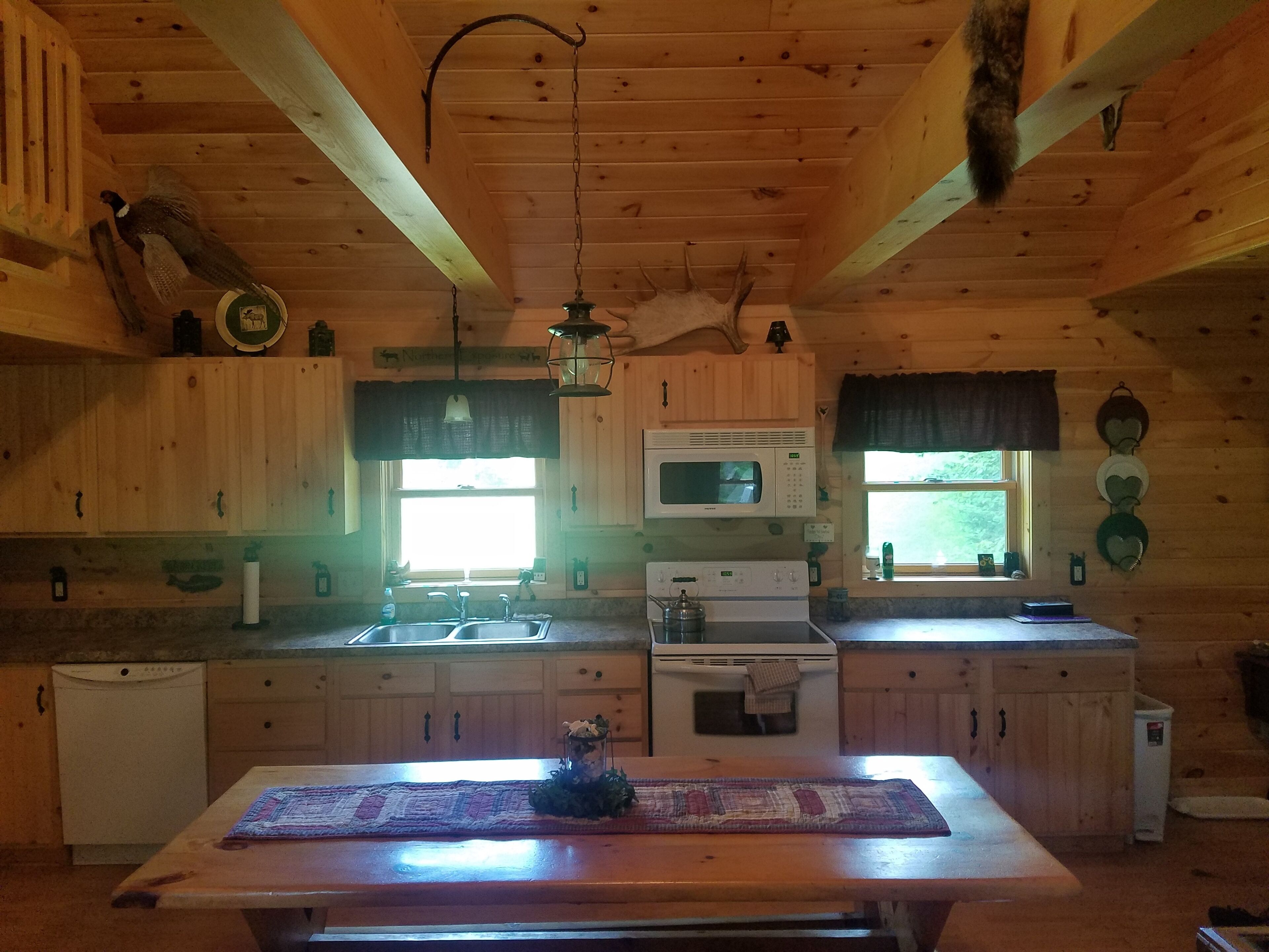 Modern Lakeside Log Cabin with Plenty of Rustic Charm. DIRECT SNOWMOBILE ACCESS