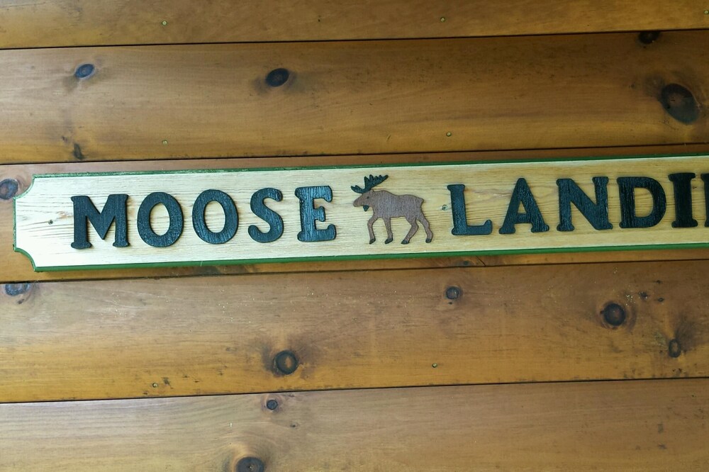 Modern Lakeside Log Cabin with Plenty of Rustic Charm. DIRECT SNOWMOBILE ACCESS