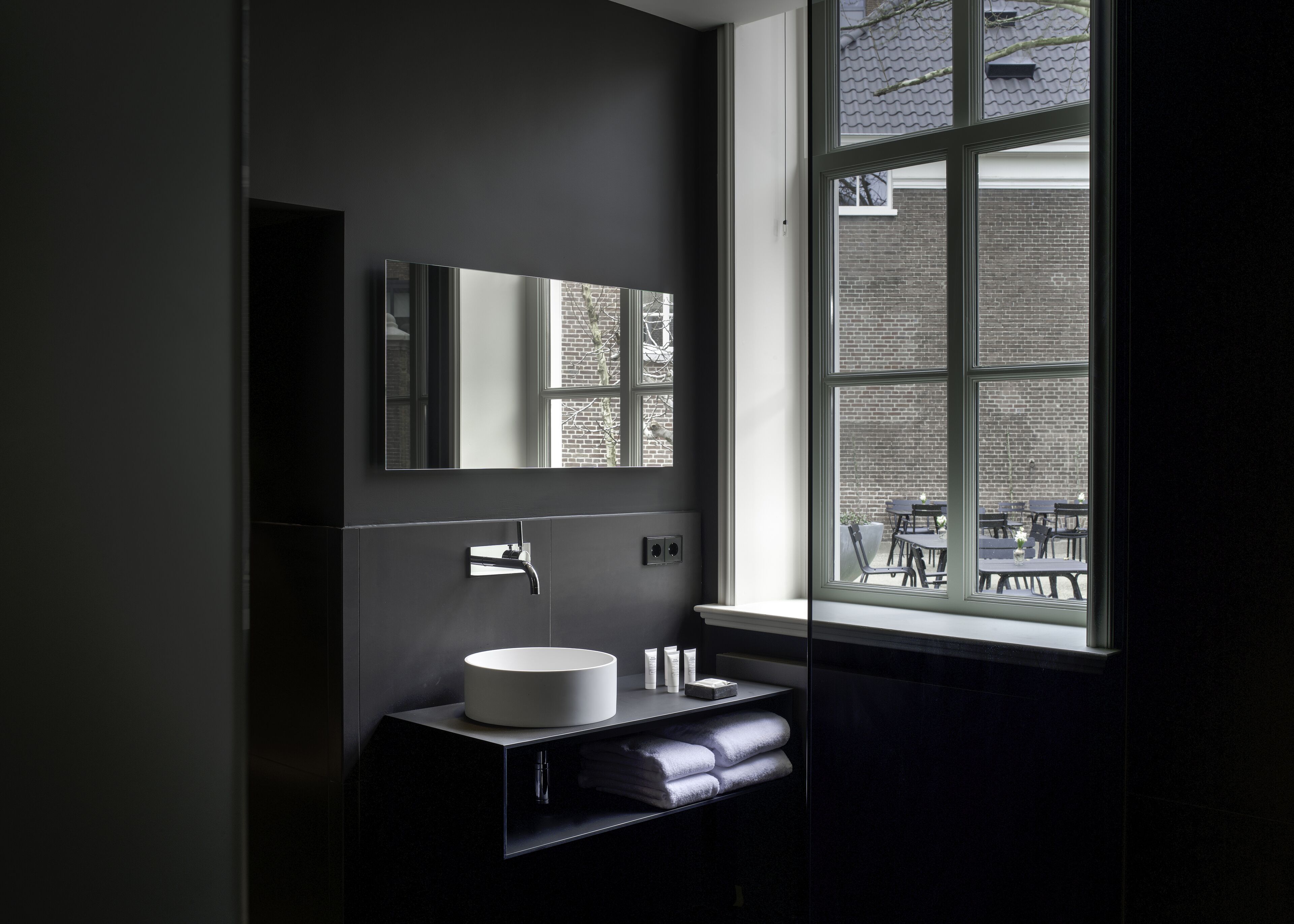 designer toiletries, hair dryer, bathrobes, towels