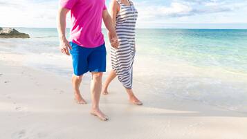 On the beach, sun-loungers, beach towels