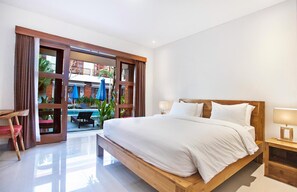 Desk, laptop workspace, blackout drapes, soundproofing - Sahadewa Suites Residence (Kerobokan)
