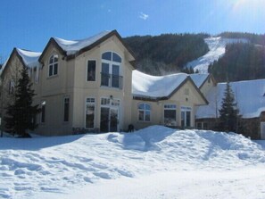 Rear of house, ski run in background