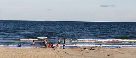 On the beach, sun-loungers, beach towels