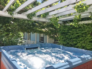 Outdoor spa tub - Farmhouse w Hot Tub, charming gardens, serenity, walk to Main Street! EV Charger (Jackson)