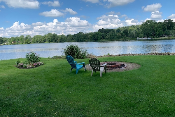 Seating by the firepit and the lake
