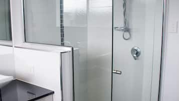 Bathtub, hair dryer, towels, soap
