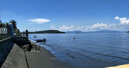 Relaxing beach side condo with mountain and island views.