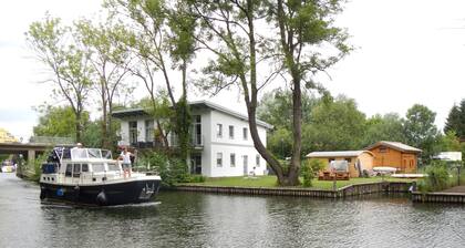 Ferienhaus Seebrise Moderne FW am See vene ja polkupyörä mukana