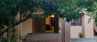 Nandhanam Eco Home Stay AC with BIke/Car Options