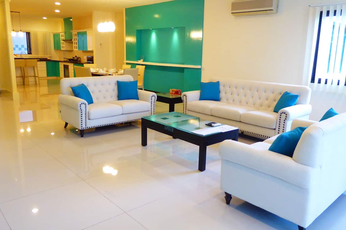 luxury apartment, 3 bedrooms, non smoking, ensuite | living room | 40-inch lcd tv with satellite channels, tv