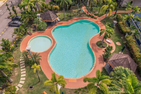 2 outdoor pools, open 8:00 AM to 8:00 PM, pool loungers