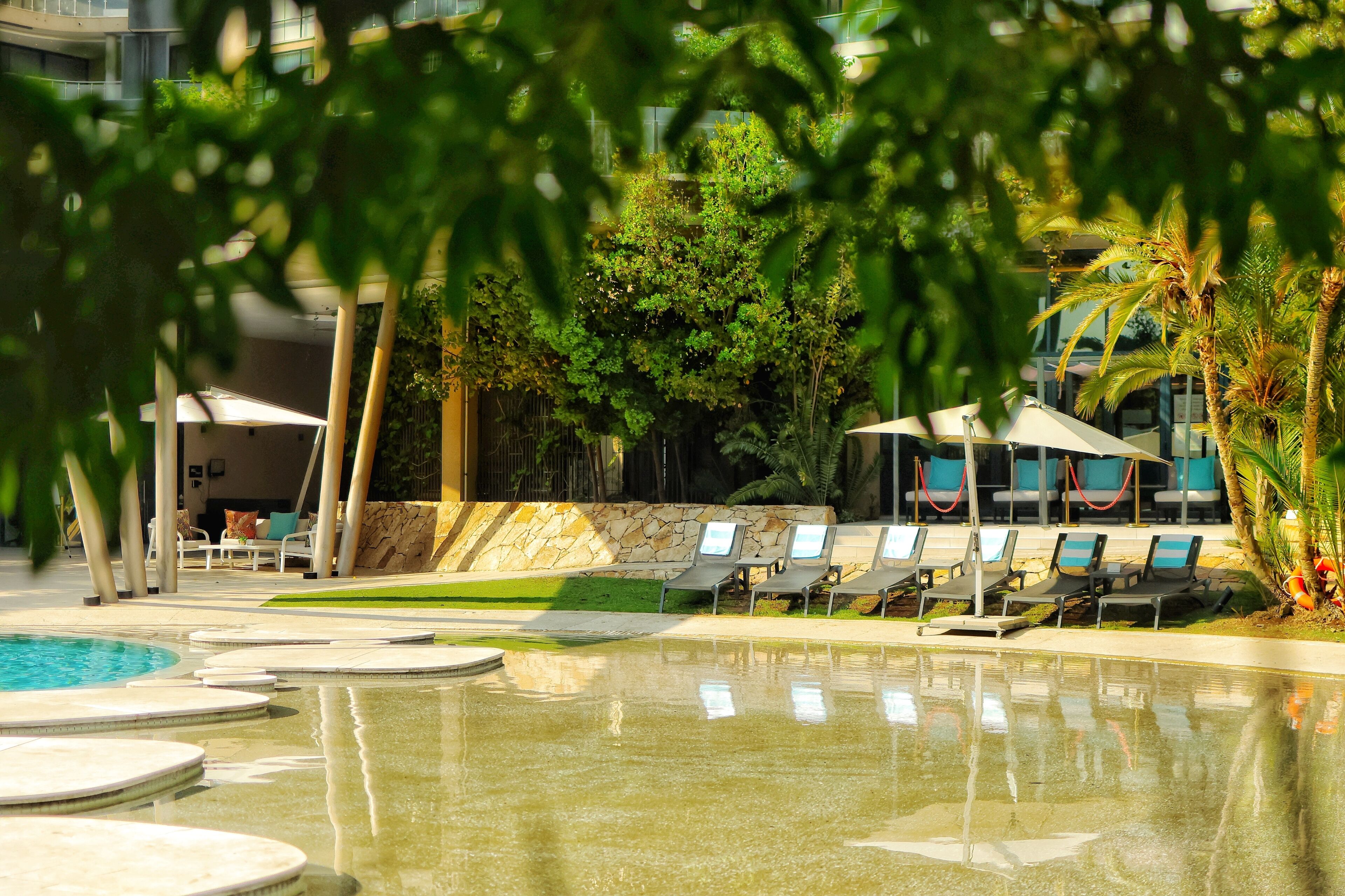 Indoor pool, 2 outdoor pools, open 9:00 AM to 6:00 PM, pool umbrellas