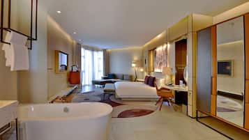 Executive Room | Bathroom | Separate tub and shower, slippers, towels