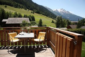 Outdoor dining - Charming Chalet at Authentic Village with Large Sunny Terrace and Magnificent View (Mühlebach)