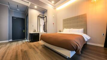 Premium bedding, down duvets, blackout curtains, soundproofing