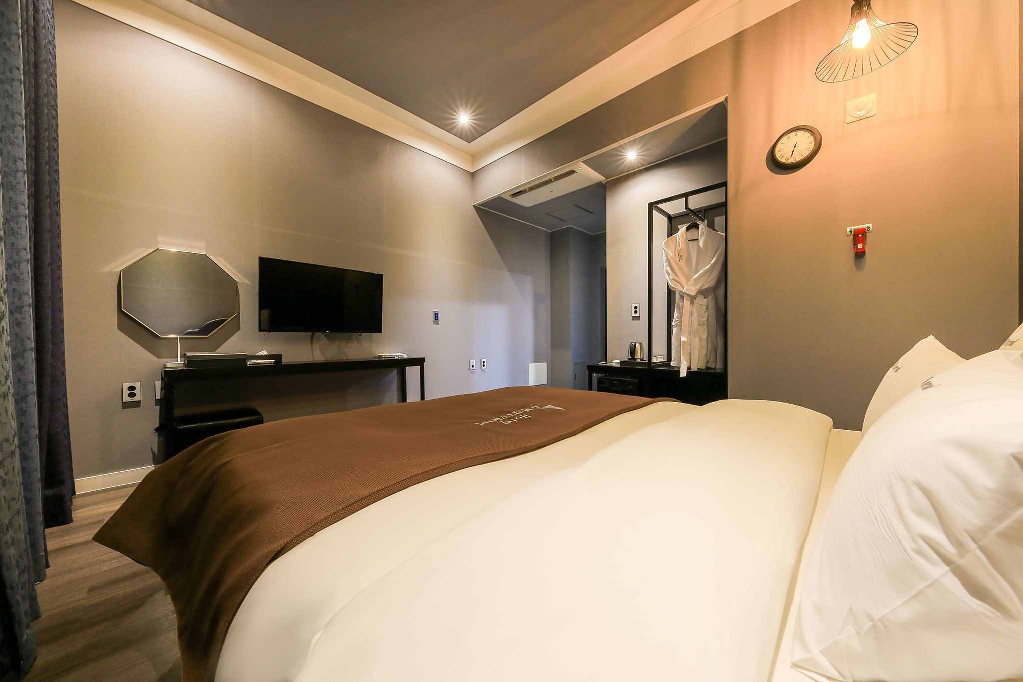 premium bedding, down duvets, blackout curtains, soundproofing