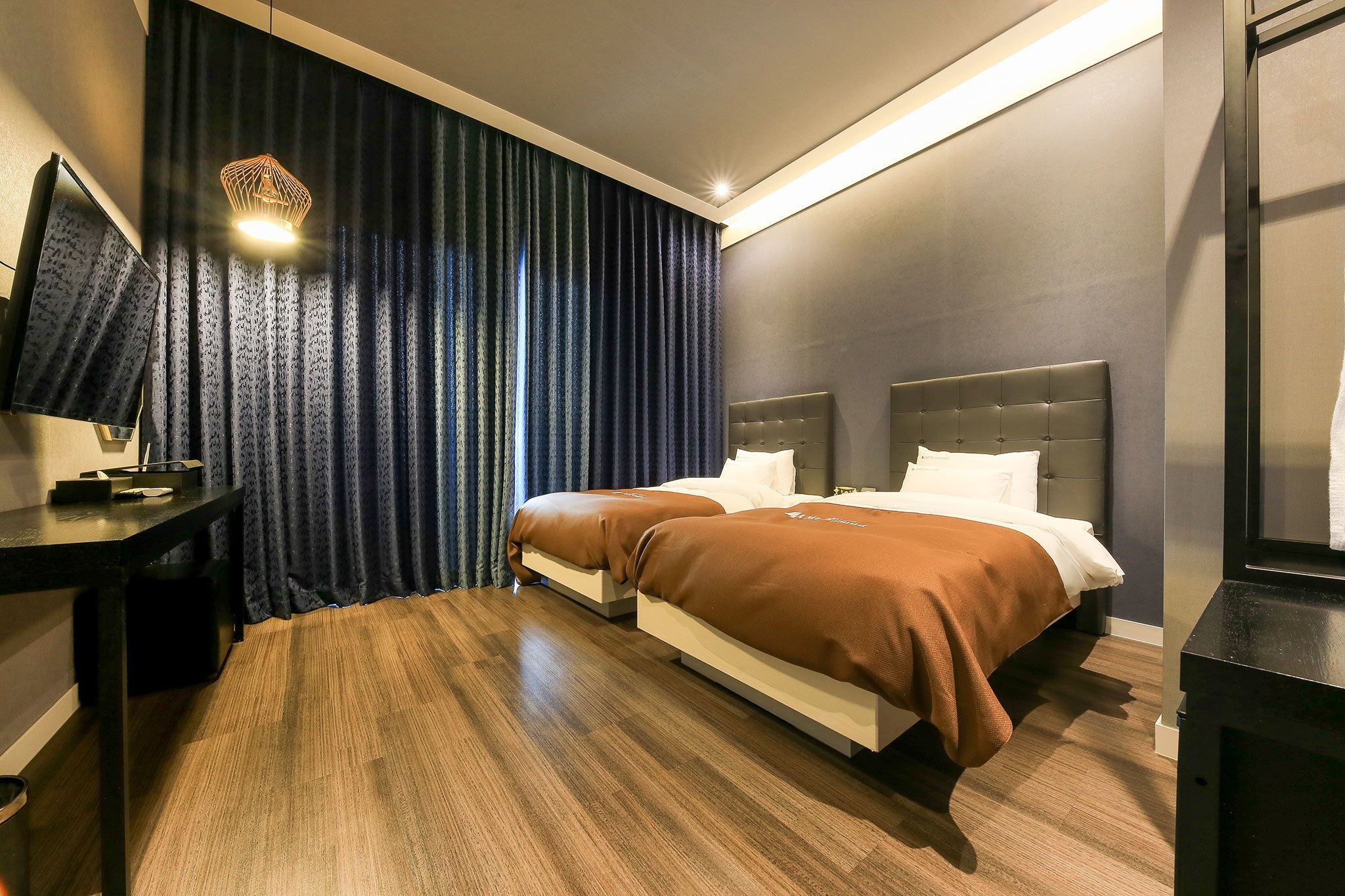 premium bedding, down duvets, blackout curtains, soundproofing