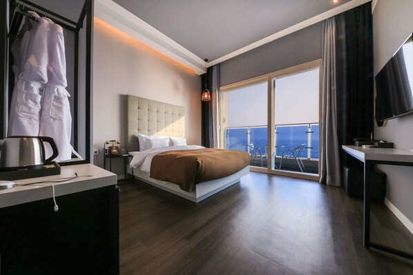 Premium bedding, down duvets, blackout curtains, soundproofing