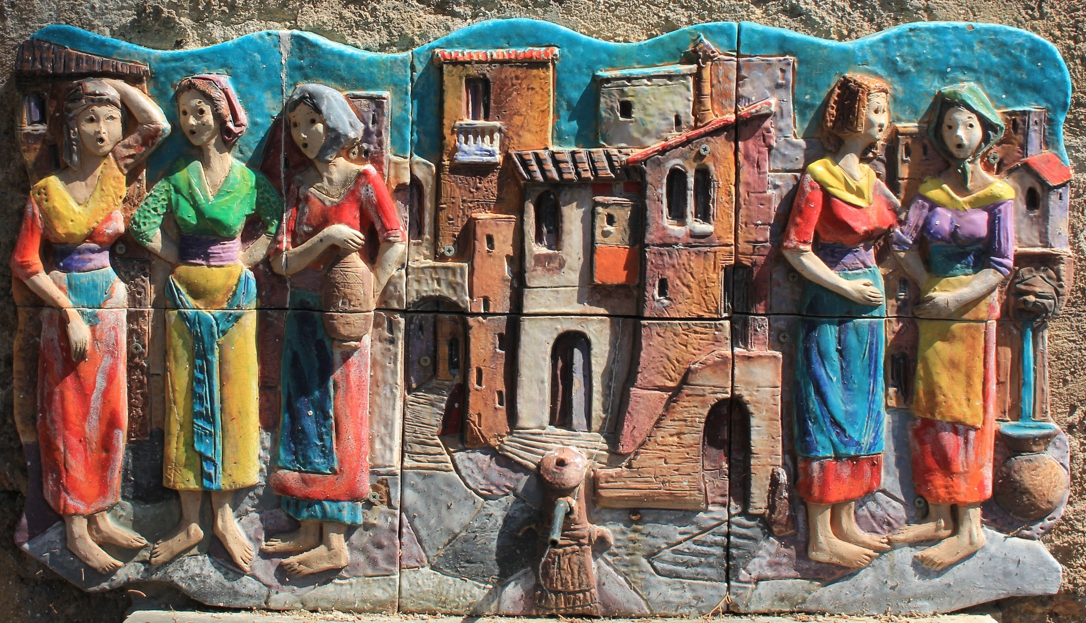 A colorful mosaic with figures and architectural elements.