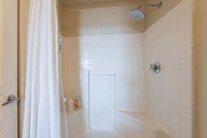 Combined shower/tub, hair dryer, towels, soap
