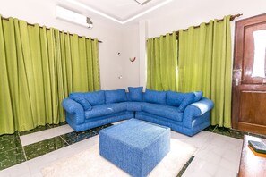 Classic Apartment, 2 Bedrooms, Non Smoking, Courtyard View | Living area | Plasma TV - Woolsack Suites (Mombasa)