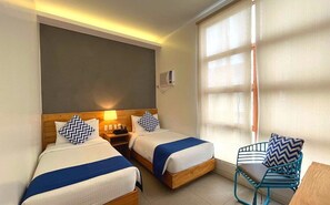 Hypoallergeen beddengoed, een minibar, een kluis op de kamer, een bureau