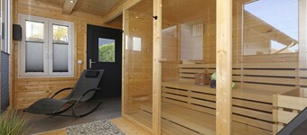 湖の上の家、屋外ジェットバス、SkyTV、サウナ、暖炉で囲まれ、湖の上に直接。