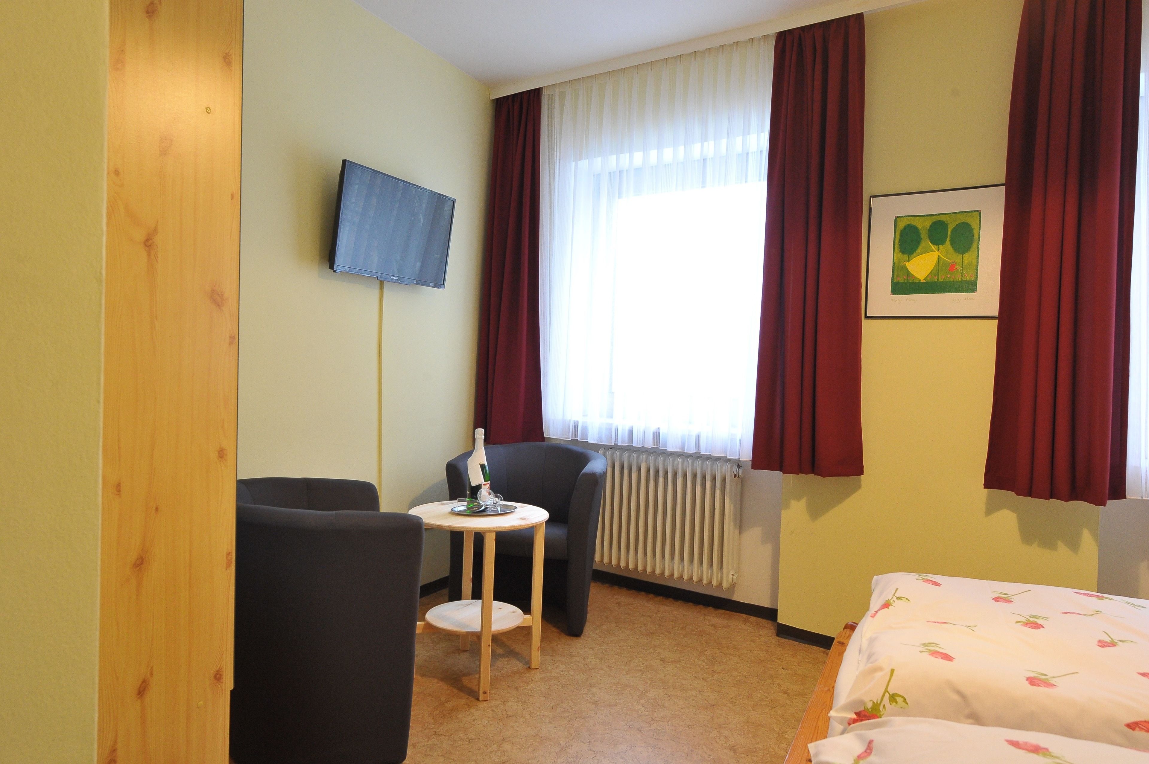 basic double room | living area | 80-cm led tv with satellite channels, tv