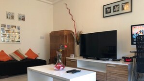 Leilighet – city | Oppholdsrom | Flatskjerm-TV