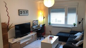 Leilighet – city | Oppholdsrom | Flatskjerm-TV