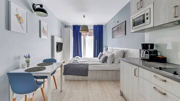 Apartamento conforto, 1 cama Queen, para não fumantes | 1 quarto, roupas de cama antialérgicas, individualmente decorados